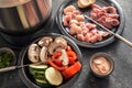 Fondue with vegetables and meat, to be fried on long forks in a pot with hot oil, convivial meal often served at a New YearÃ¢â¬â¢s Royalty Free Stock Photo