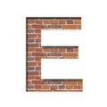 Font on brick texture. Letter E, cut out of paper on a background of real brick wall. Volumetric white fonts set