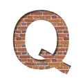Font on brick texture. Letter Q, cut out of paper on a background of real brick wall. Volumetric white fonts set