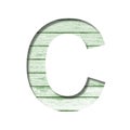 Font on an old wooden wall. The letter C cut out of paper on the background old wood wall with peeled green paint. Set of Royalty Free Stock Photo