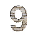 Font on white brick. The digit 9, nine is cut from white paper the background of a sloppy white brick wall. Popular decorative