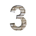 Font on white brick. The digit 3, three is cut from white paper the background of a sloppy white brick wall. Popular decorative