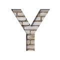 Font on white brick. The letter Y is cut from white paper the background of a sloppy white brick wall. Popular decorative fonts