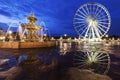 Fontaine des Fleuves and Ferris Wheel on Place de la Concorde in Royalty Free Stock Photo