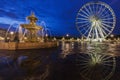 Fontaine des Fleuves and Ferris Wheel on Place de la Concorde in Royalty Free Stock Photo