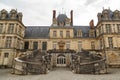 Fontainebleau, France, March 30, 2017: Royal castle of Fontainebleau. The castle is of Renaissance style, located near Royalty Free Stock Photo