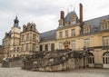 Fontainebleau, France, March 30, 2017: Royal castle of Fontainebleau. The castle is of Renaissance style, located near Royalty Free Stock Photo