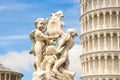 Fontana dei Putti and Leaning Tower of Pisa Torre pendente di Pisa in Piazza dei Miracoli Square of Miracles in Pisa, Italy Royalty Free Stock Photo