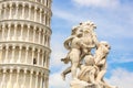 Fontana dei Putti and Leaning Tower of Pisa Torre pendente di Pisa in Piazza dei Miracoli Square of Miracles in Pisa, Italy Royalty Free Stock Photo