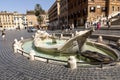 Fontana della Barcaccia in Piazza Spagna. This fountain is at the center of the square, represents a wrecked ship, made by Pietro Royalty Free Stock Photo