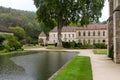 Fontenay Abbey in France. Image of lake and lodgings.