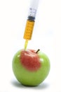 Food additive apple syringe Royalty Free Stock Photo