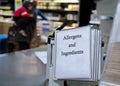 Food allergy and ingredients documents binder at grocery store