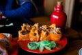 Food art, traditional seafood, restaurant menu photo. Tasty set of japanese sushi maki rolls served on round plate Royalty Free Stock Photo