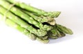 Food background asparagus flat lay pattern. bunch of fresh green asparagus on white background, top view