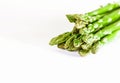 Food background asparagus flat lay pattern. bunch of fresh green asparagus on white background, top view