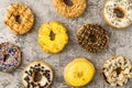 Assortment of donuts on stone background