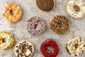 assortment of donuts on stone background