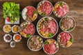 Assortment of Thai stlye fresh beef noodles on wooden table for restaurant menu