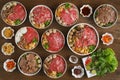 Assortment of Thai stlye fresh beef noodles on wooden table for restaurant menu