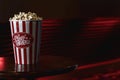 Food background of big cup or bucket of popcorn to eat as snack in cinema theater Royalty Free Stock Photo