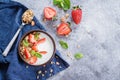 Food Background. Breakfast with yogurt, granola and strawberries. Healthy Diet Food Concept Royalty Free Stock Photo