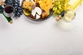 Food background with cheese. Blocks of moldy cheese, grapes, honey, nuts over on white background. Copy space. Royalty Free Stock Photo