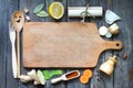 Food background concept with recipe and retro empty cutting board