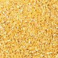 Food background - crushed polished wheat grains