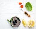 Food background with fresh herbs tomato ,lemon slice , black pe Royalty Free Stock Photo