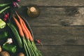 Food background, fresh organic vegetables on old rustic wooden planks