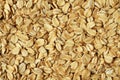 Food background - oat-flakes situated arbitrarily. Day Light Royalty Free Stock Photo