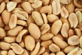 Food background - salted roasted peanuts situated arbitrarily Royalty Free Stock Photo