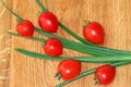 Food background. Space for text. Cherry tomato, green onion. Still life. Healthy vegetarian cuisine.