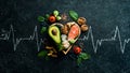 Food banner. Healthy foods low in carbohydrates. Food for heart health: salmon, avocados, blueberries, broccoli, nuts and Royalty Free Stock Photo