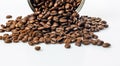 Food banner. Open tin can and grains of black coffee on a white background. Fragrant roasted arabica beans on a white table. Royalty Free Stock Photo