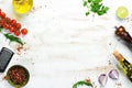 Food banner. Spices, vegetables and herbs on a white wooden background. Top view.