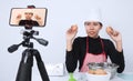 Food blogger. Asian woman chef streaming live Royalty Free Stock Photo
