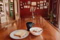 Food for breakfast at historical home. Dinning table with granola, yogurt, toast and hot coffee