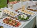 Food or buffet and table set at ceremony or event garden Royalty Free Stock Photo