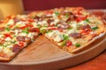 Food, cheese and pizza on table in restaurant with mozzarella, salami and herbs. Cooking, kitchen and fresh margherita Royalty Free Stock Photo