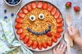 Food for children. Funny sun with a smile