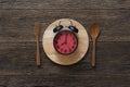 Food clock. Healthy food concept on wooden table Royalty Free Stock Photo