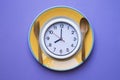 Food clock time for breakfast, Healthy food concept on purple ba Royalty Free Stock Photo