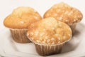 Food : Close up of lemon muffins on a white plate. 1