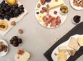 Food composition cheese platewith cheese, dry meats, various fruits and nuts. Overhead of set of pieces moldy Royalty Free Stock Photo