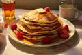 Delicious pancakes with berries and syrup