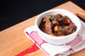 Food concept French red wine beef stew bourguignon on wooden board with copy space Royalty Free Stock Photo