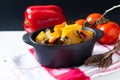 Food concept Homemade French organic Ratatouille in white bake ceramic bowl on blask slate stone board Royalty Free Stock Photo