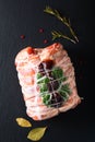 Food concept homemade raw Stuffed Pork Tenderloin on black slate Royalty Free Stock Photo